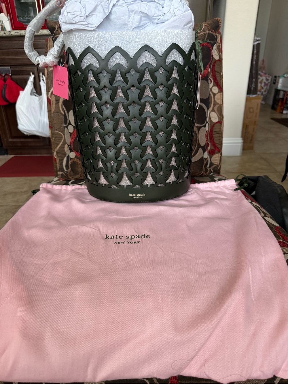 kate spade deep green bucket bag with pink tag
